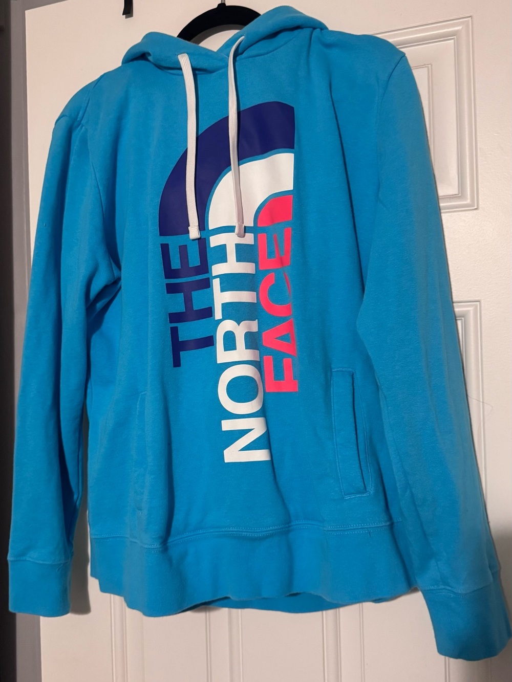 The North Face women’s Teal Crewneck Hoodie with Multicolor Logo